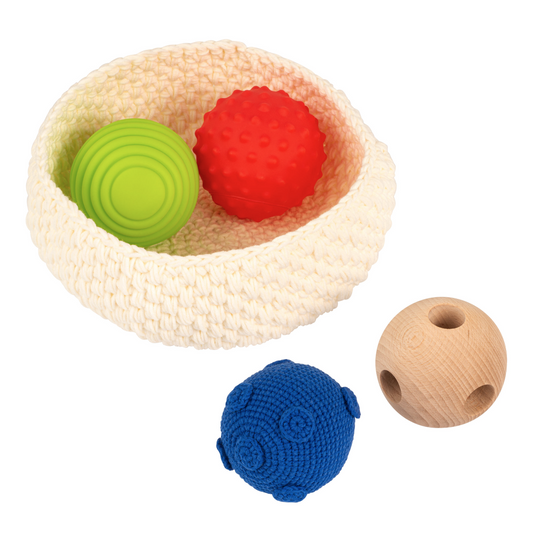 Cesta con 4 pelotas sensoriales