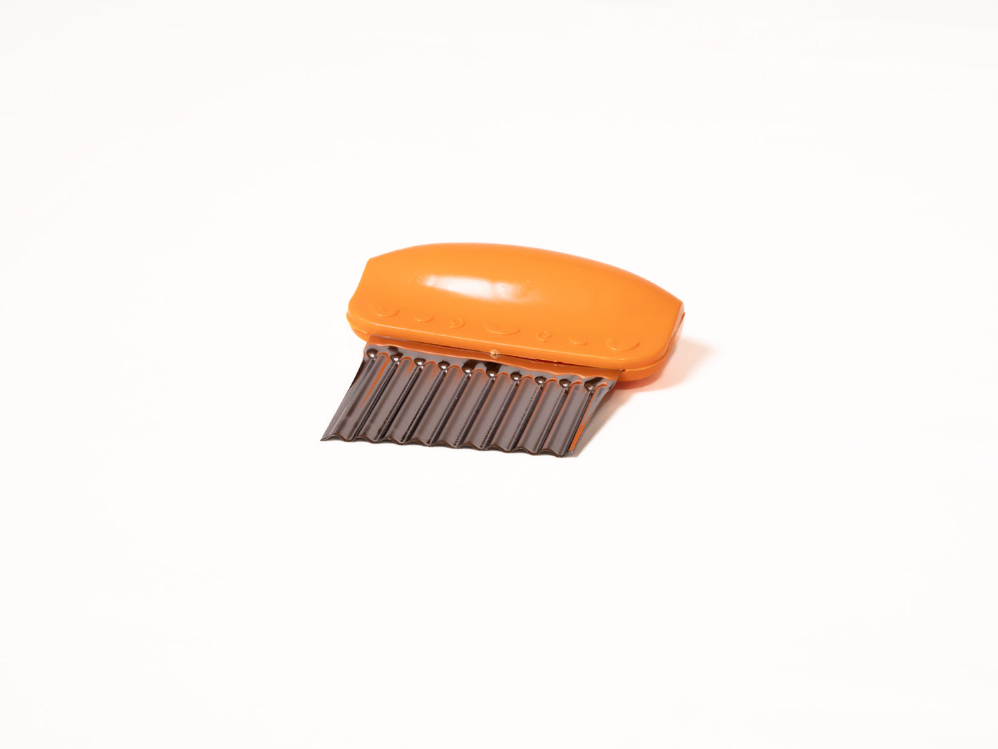 Cortador de verduras naranja
